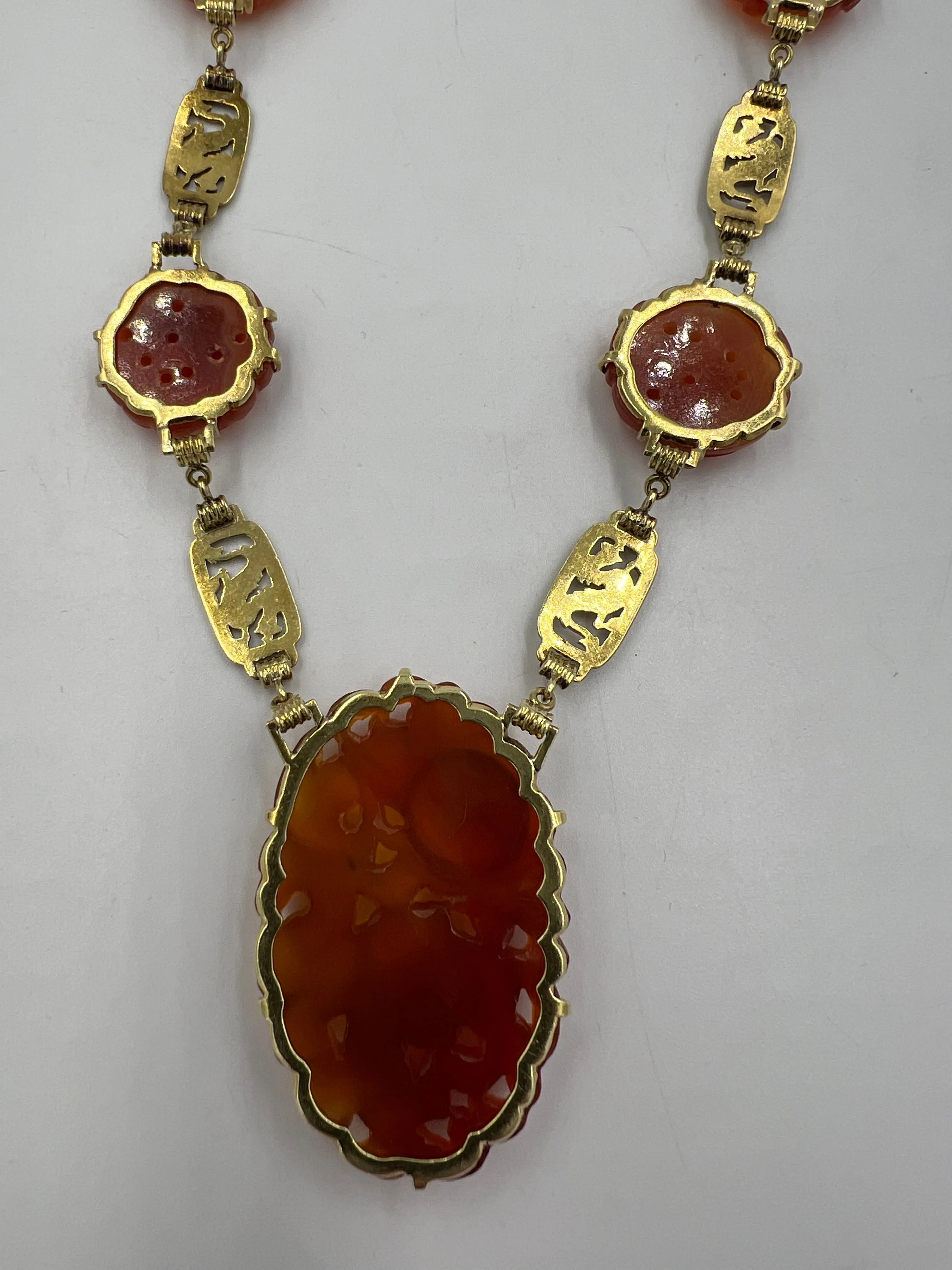 Art Deco Carved Carnelian And Enamel Dragon Yellow Gold Necklace Circa 1925