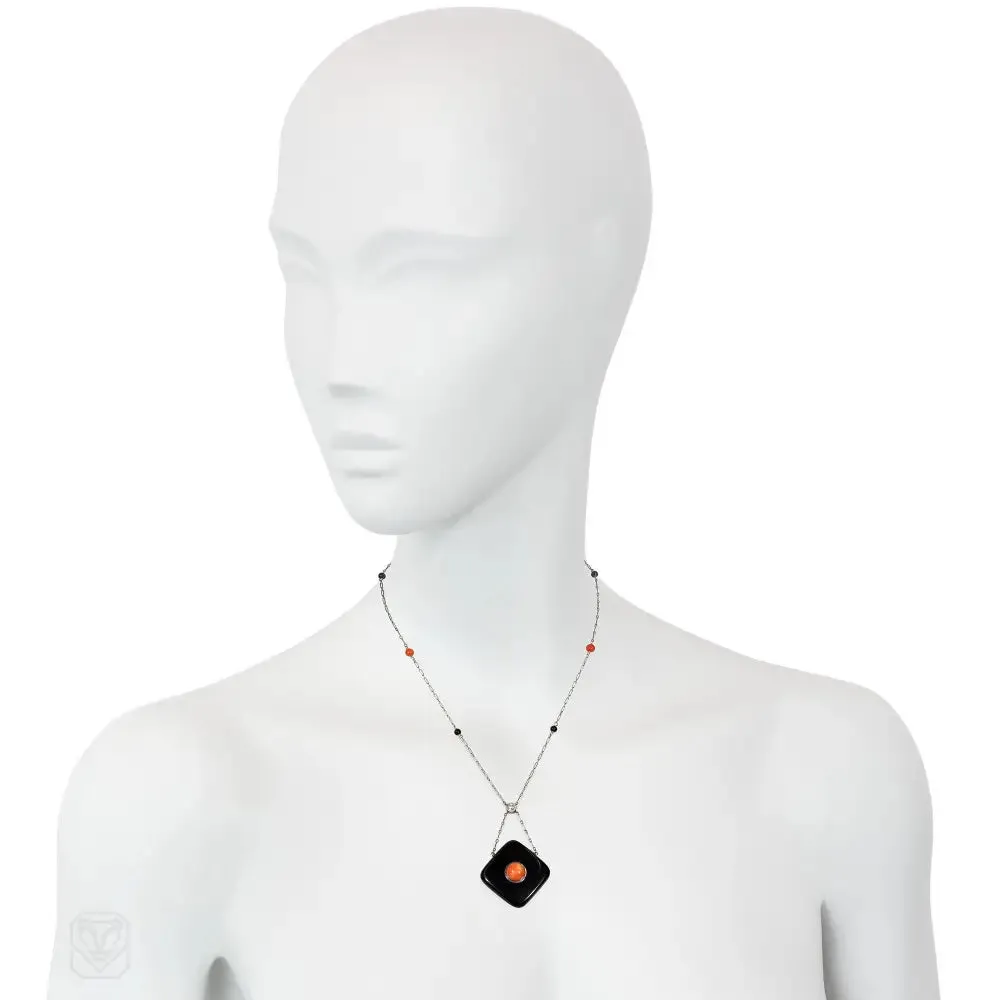 Art Deco onyx, coral, and diamond pendant necklace