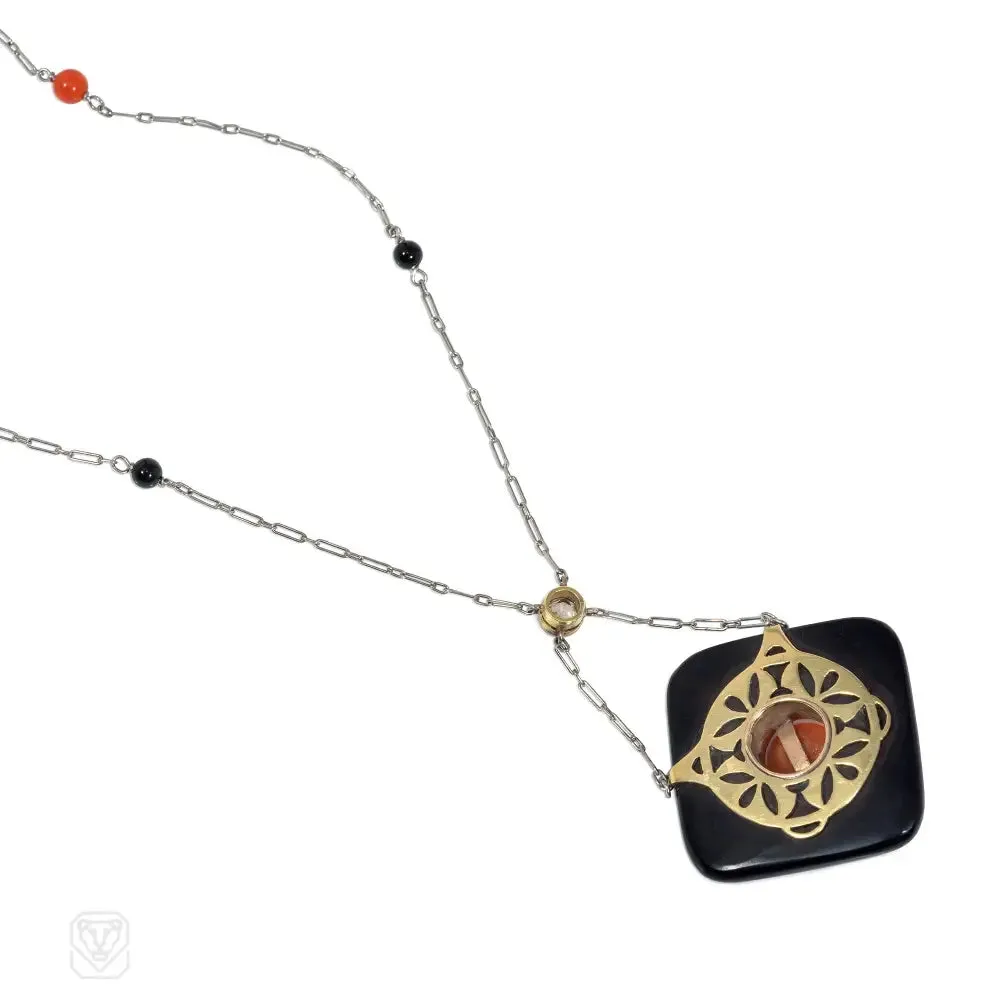 Art Deco onyx, coral, and diamond pendant necklace