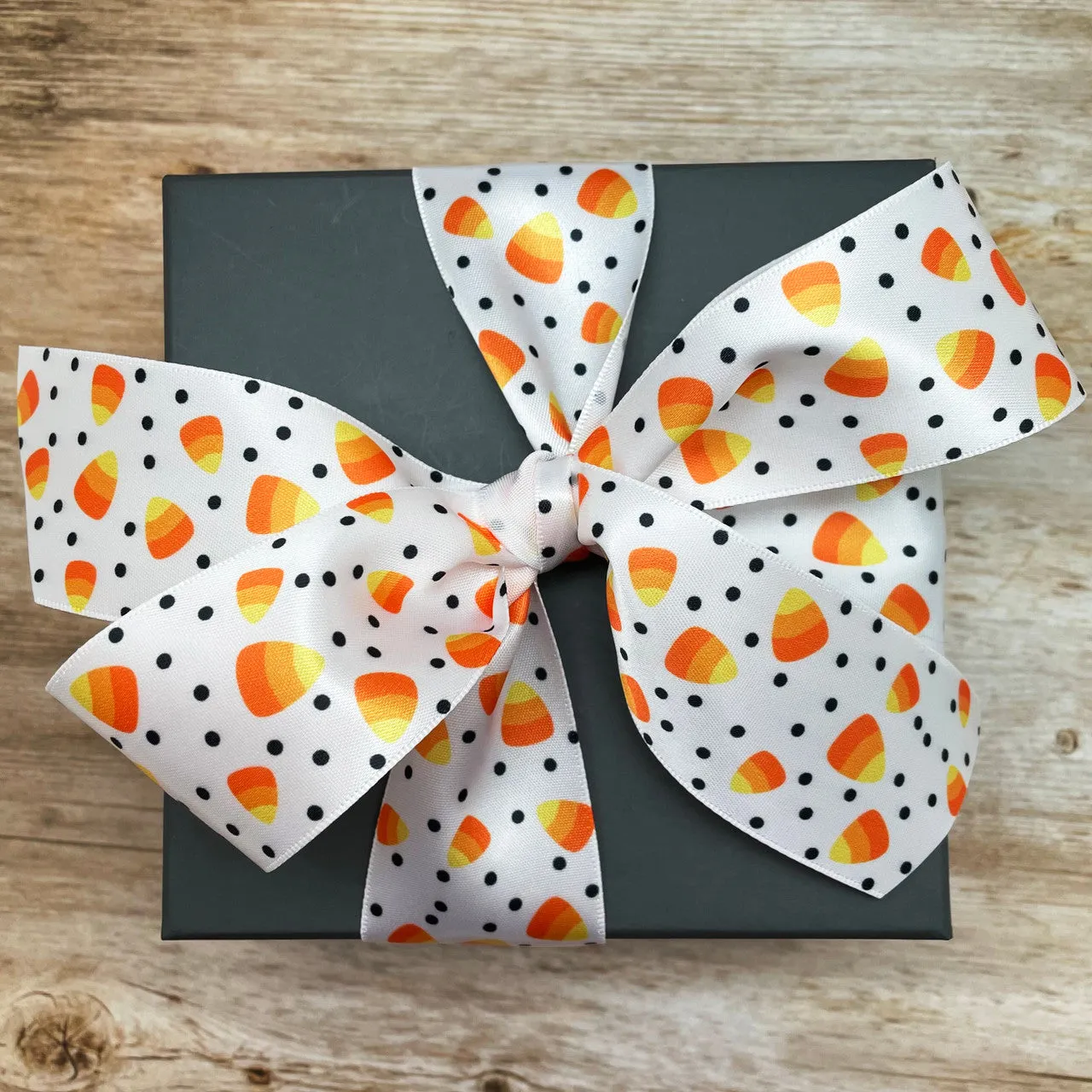 Candy Corn ribbon with polka dots ideal for Halloween  printed on 1.5" white satin